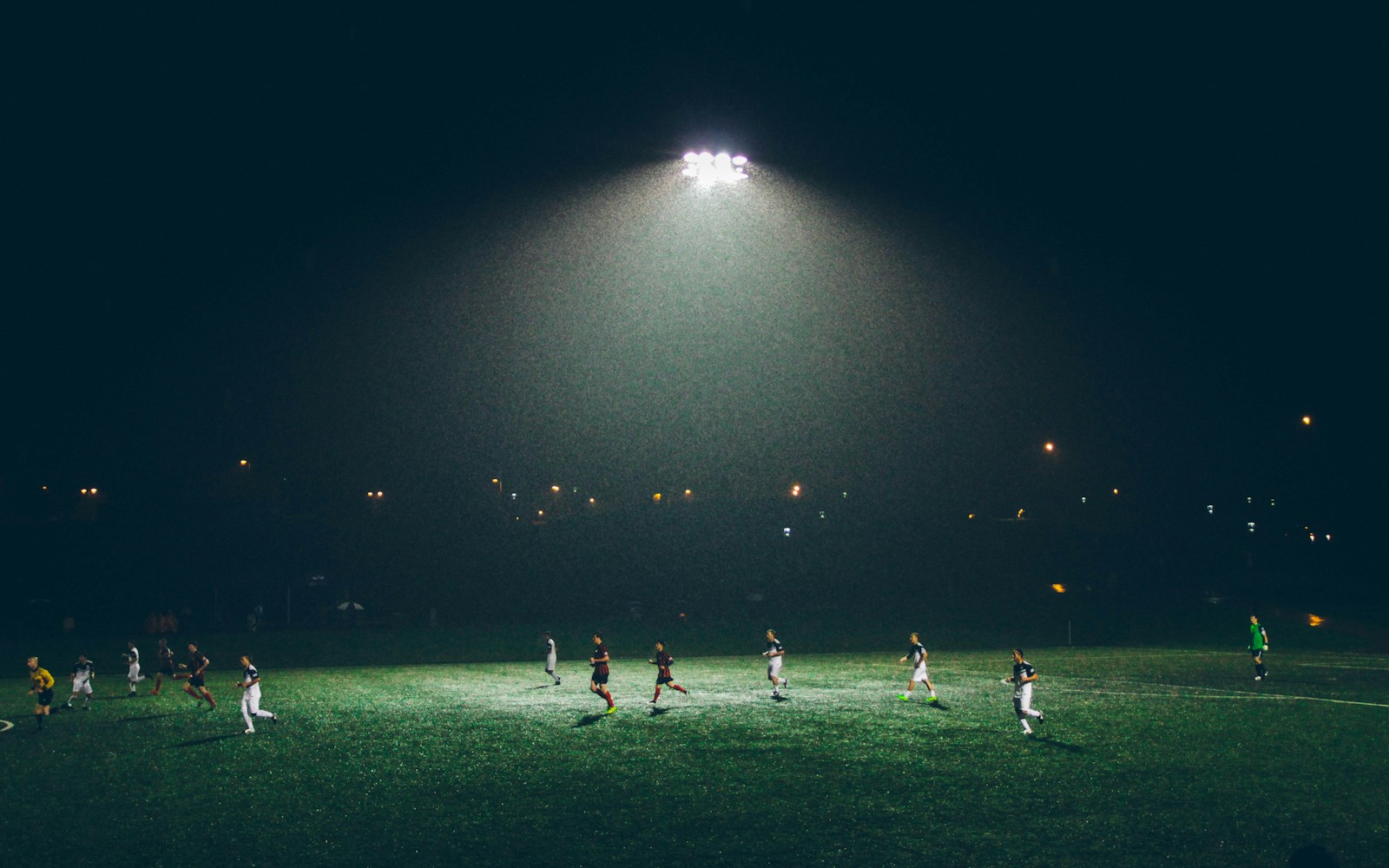 Team running a passing pattern